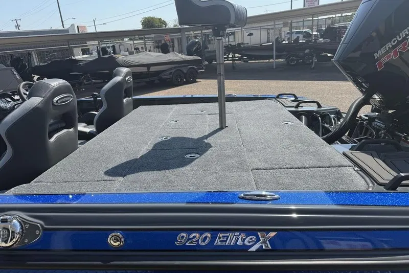 Slide: The Image of 2026 Phoenix 920 Elite X boat with spacious deck and seating. - 11