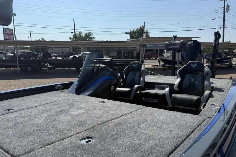 Slide: The Image of 2026 Phoenix 920 Elite X boat interior with dual seats and dashboard. - 15