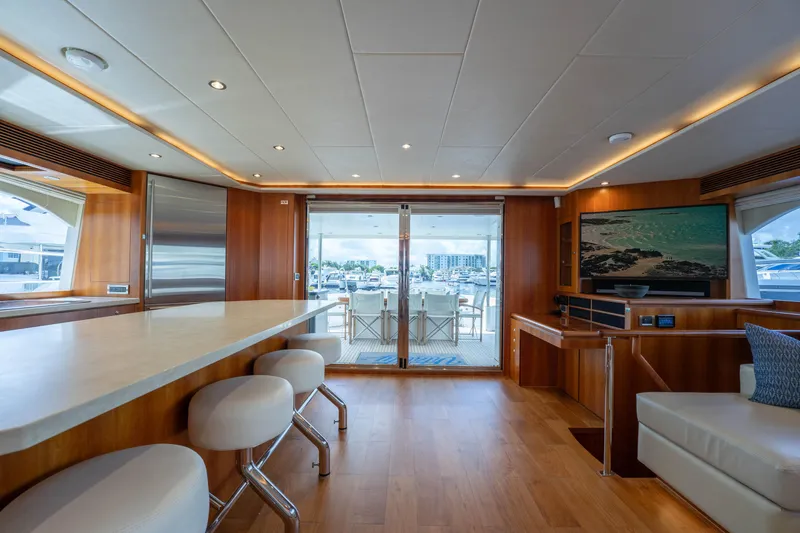 Slide: The Image of Luxurious interior of 2016 Horizon PC60 yacht with modern design and elegant furnishings. - 10