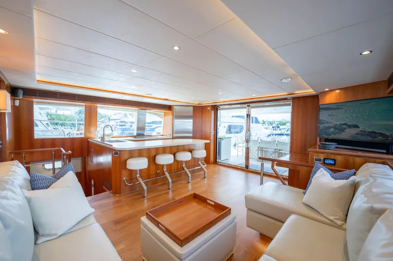 Slide: The Image of Luxurious interior of 2016 Horizon PC60 yacht with modern seating and large windows. - 12