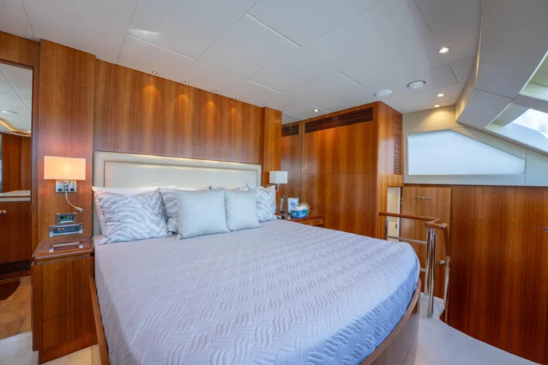 Slide: The Image of Luxurious bedroom interior on 2016 Horizon PC60 yacht with elegant wood paneling. - 15