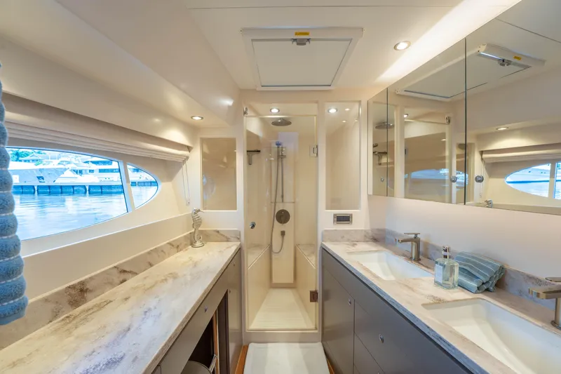 Slide: The Image of Luxurious bathroom interior of 2016 Horizon PC60 yacht with dual sinks and shower. - 20