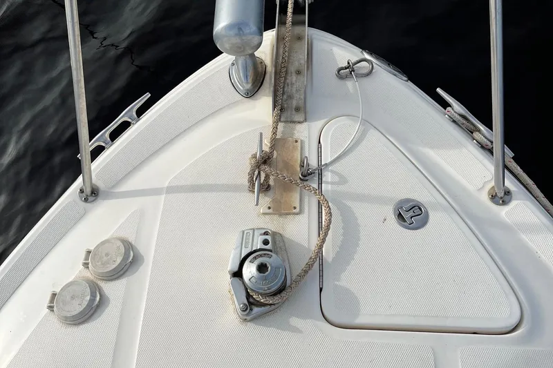 Slide: The Image of Dashboard of a 2003 Sea Ray 280 Sundancer boat with gauges and controls. - 10