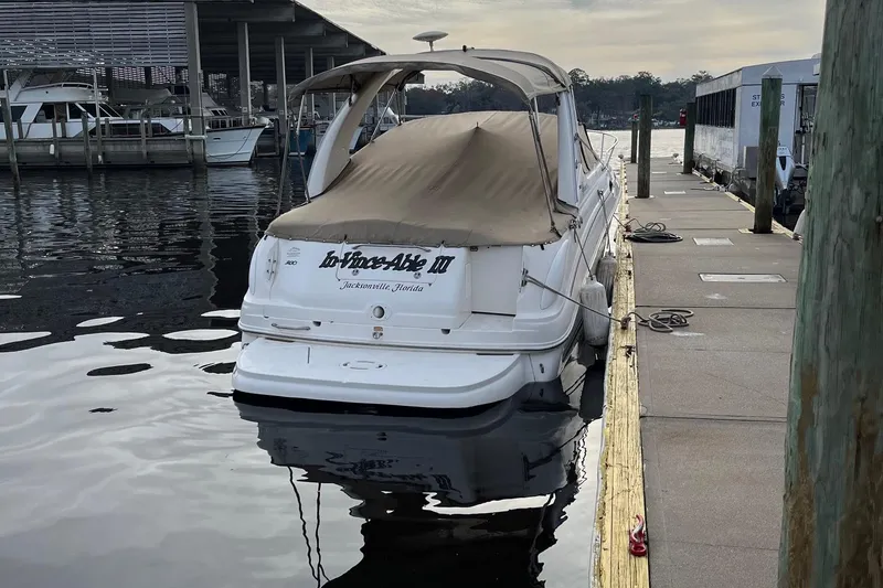 Slide: The Image of Electrical panel and stereo system in a 2003 Sea Ray 280 Sundancer boat. - 15