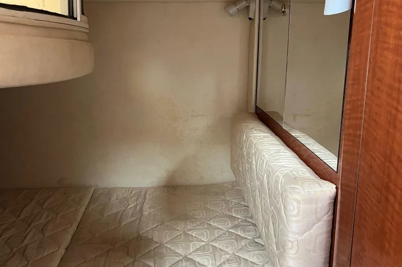 Slide: The Image of Control panel of a 2003 Sea Ray 280 Sundancer boat, featuring AC circuit breaker. - 19