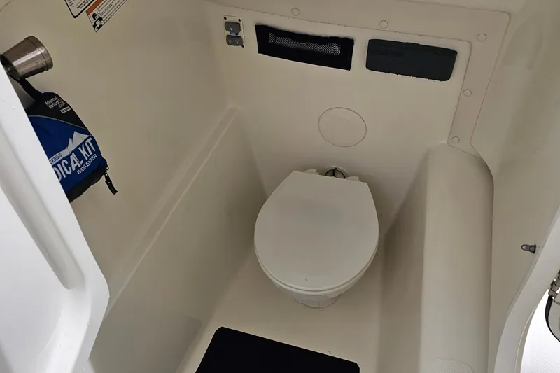 Slide: The Image of Compact marine toilet in 2018 WorldCat 255 DC boat, featuring a first aid kit. - 16
