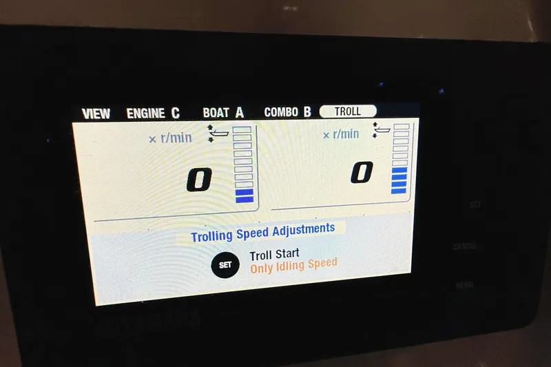 Slide: The Image of Display screen of 2018 WorldCat 255 dc showing trolling speed adjustments and RPM settings. - 20