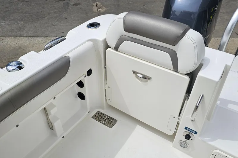Slide: The Image of WorldCat 255 DC boat interior, featuring seating and storage, 2018 model. - 6