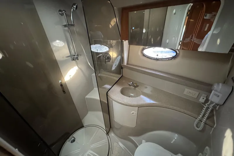 Slide: The Image of Luxurious bathroom in 2002 Regal Commodore 3860 yacht with shower and vanity. - 23