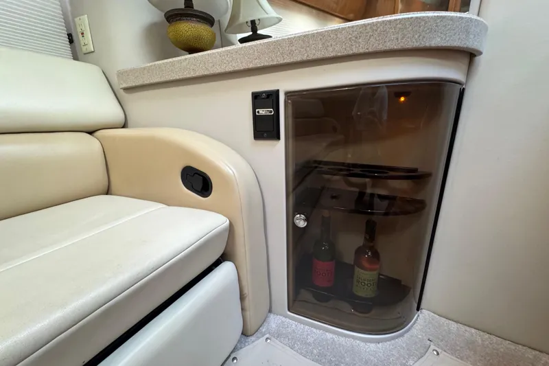 Slide: The Image of Interior of 2002 Regal Commodore 3860 yacht with wine storage cabinet. - 32
