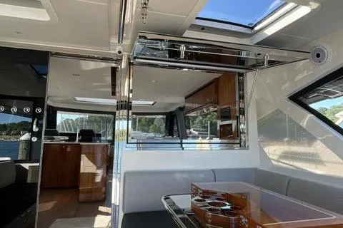 Slide: The Image of Interior of 2025 Riviera 585 SUV yacht, featuring modern design and luxurious amenities. - 16