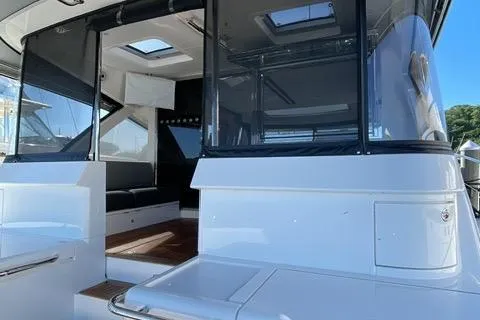 Slide: The Image of 2025 Riviera 585 SUV luxury yacht with sleek design and spacious interior. - 20