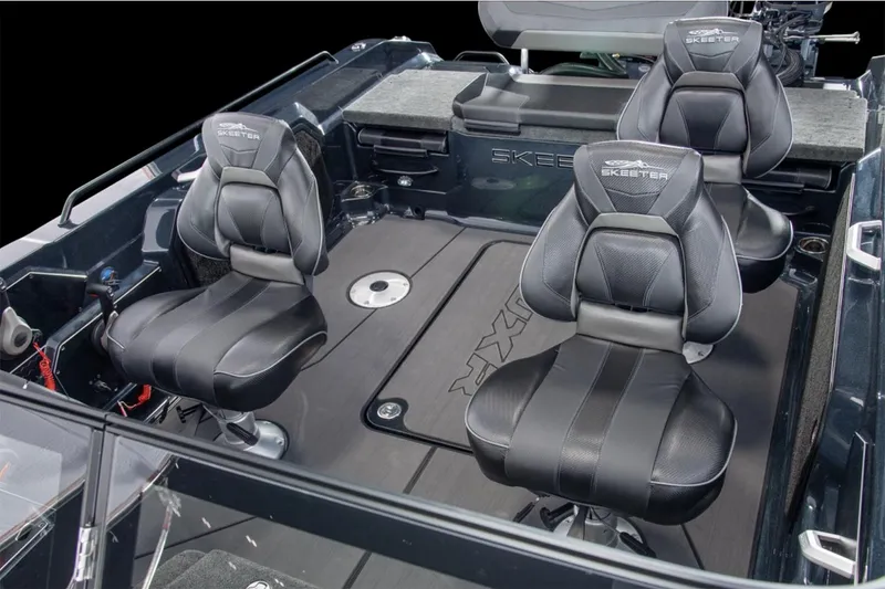 Slide: The Image of Manufacturer Provided Image: 2026 Skeeter WXR2060 boat interior with sleek dashboard and modern controls. - 10