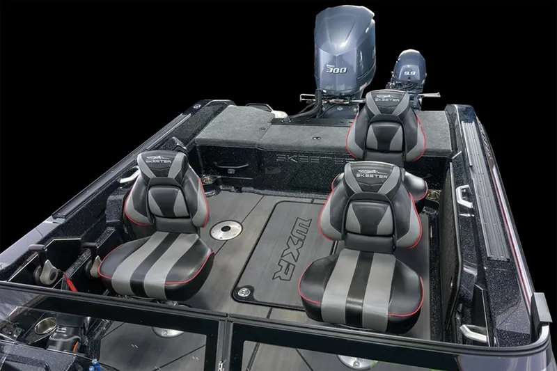 Slide: The Image of Manufacturer Provided Image: 2026 Skeeter WXR2060 boat cruising on a lake with two passengers. - 11