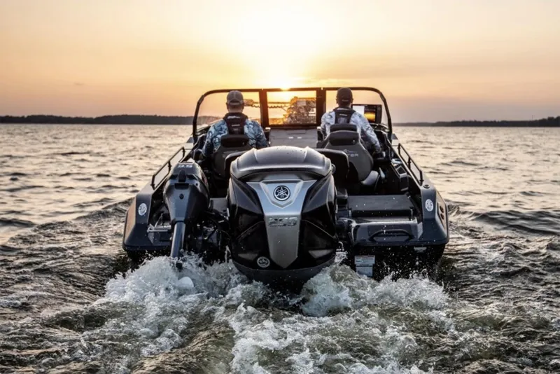 Slide: The Image of Manufacturer Provided Image: Two people riding a 2026 Skeeter WXR2060 boat on a lake, creating a splash. - 6