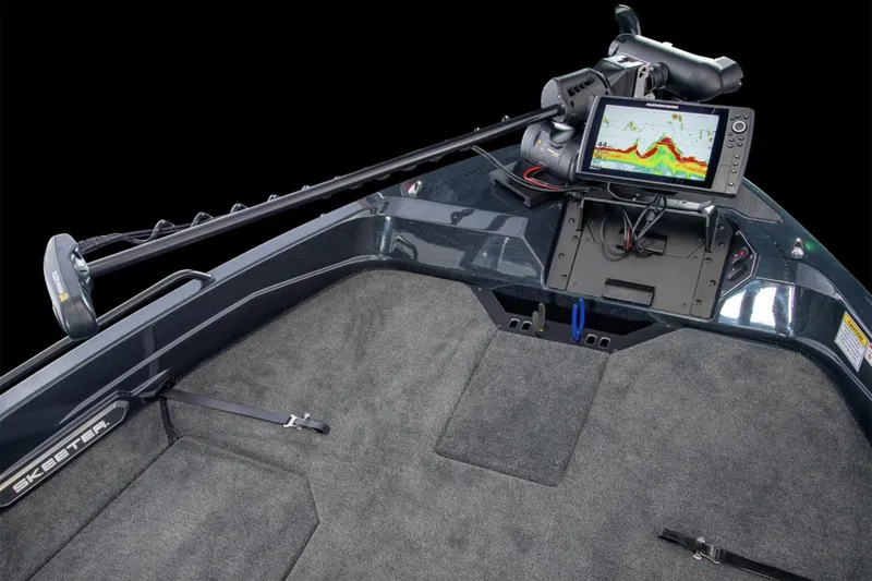 Slide: The Image of Manufacturer Provided Image: 2026 Skeeter WXR2060 boat cruising on open water with two passengers. - 7