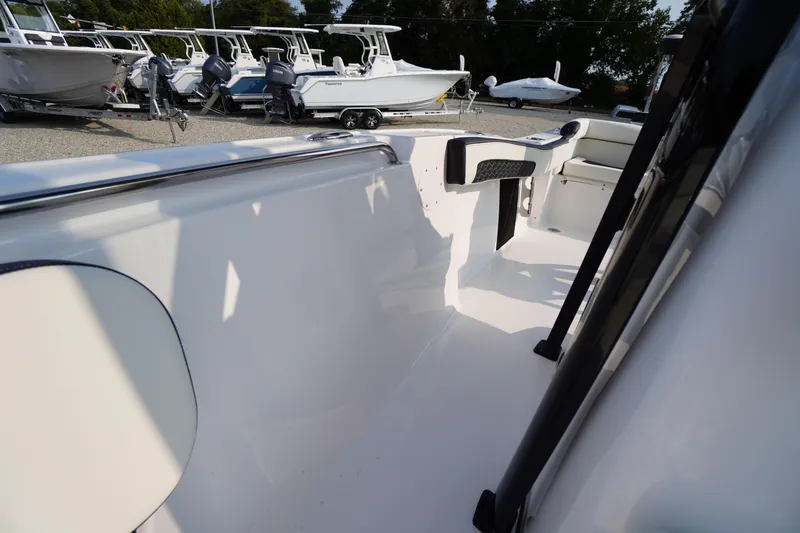 Slide: The Image of 2026 Tidewater 210 LXF boat interior with sleek design and modern features. - 13
