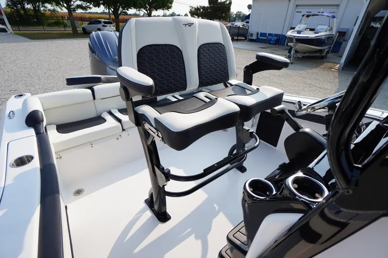 Slide: The Image of 2026 Tidewater 210 LXF boat interior with dual seating and modern design. - 29