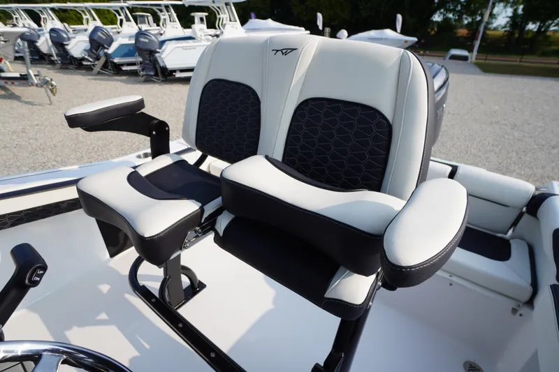Slide: The Image of 2026 Tidewater 210 LXF boat seats with black and white upholstery, showcasing modern design. - 30