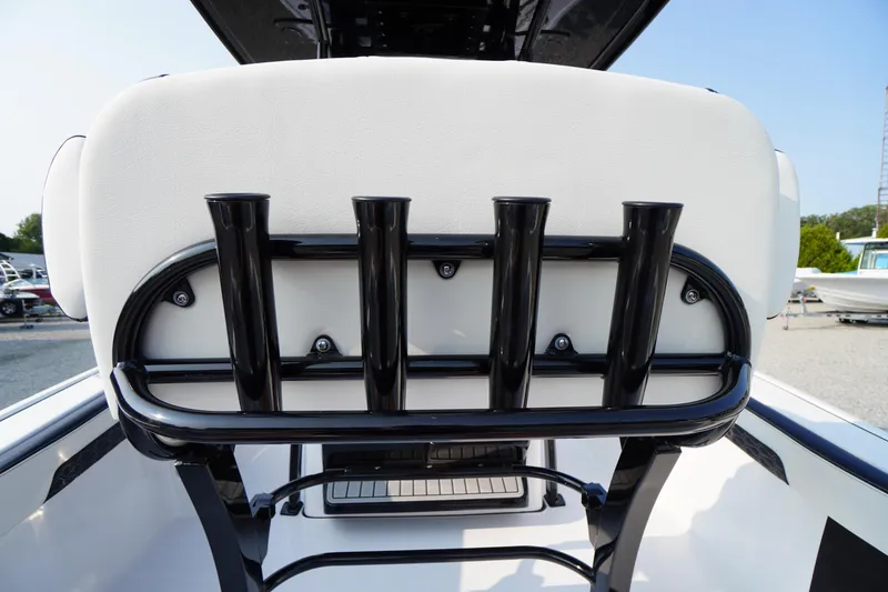 Slide: The Image of 2026 Tidewater 210 LXF boat with black rod holders and white seating. - 42