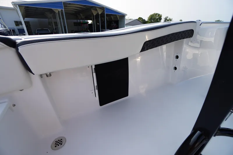 Slide: The Image of 2026 Tidewater 210 LXF boat interior, featuring sleek white seating and modern design elements. - 43