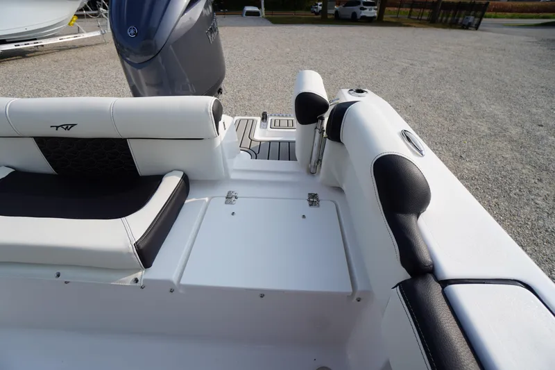 Slide: The Image of 2026 Tidewater 210 LXF boat interior with sleek seating and modern design. - 46