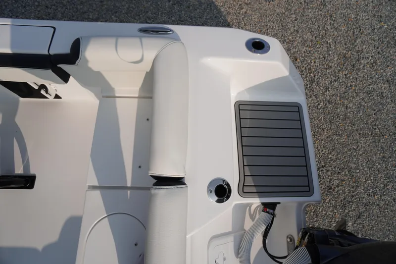 Slide: The Image of 2026 Tidewater 210 LXF boat interior, featuring sleek seating and modern design elements. - 48