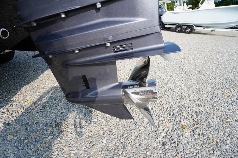 Slide: The Image of Close-up of Yamaha Reliance Series propeller on 2026 Tidewater 210 LXF boat. - 55