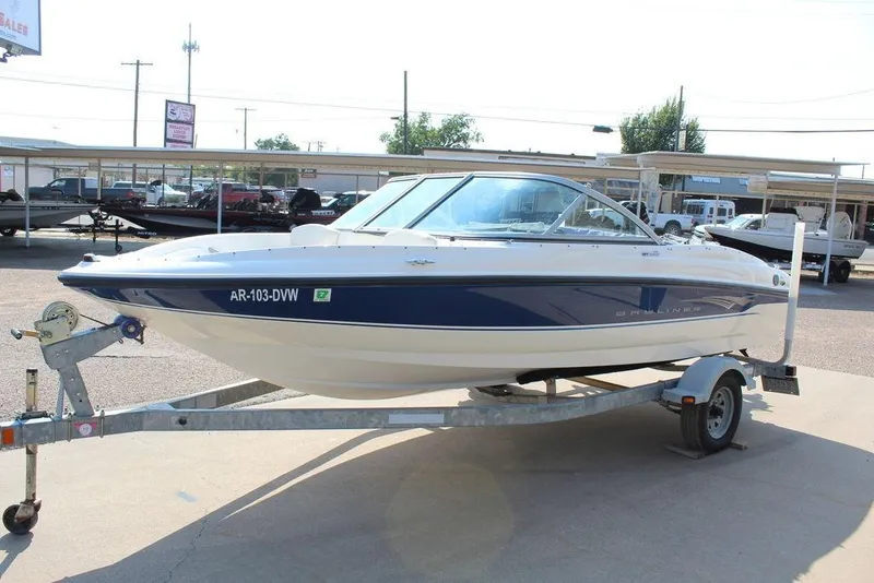 Slide: The Image of 2009 Bayliner 175 GT boat on trailer in outdoor dealership lot. - 10