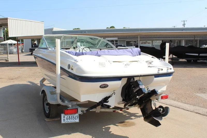 Slide: The Image of 2009 Bayliner 175 GT boat on trailer, parked outdoors in a lot. - 5