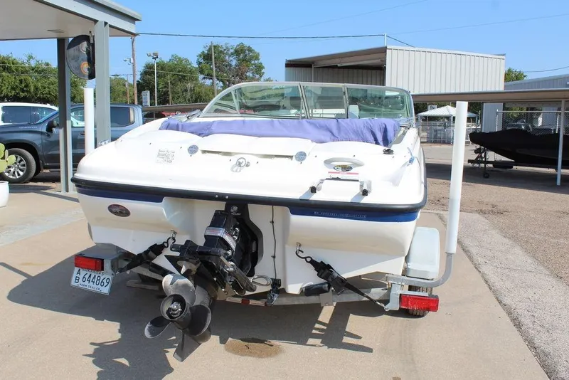 Slide: The Image of 2009 Bayliner 175 GT boat on trailer, rear view, parked outdoors. - 6