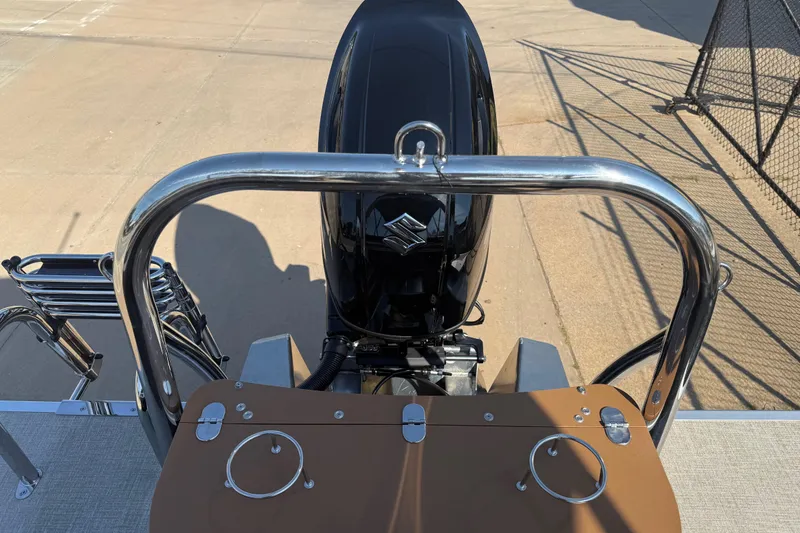 Slide: The Image of 2026 Avalon VENTURE QUAD LOUNGER boat engine and deck view. - 19