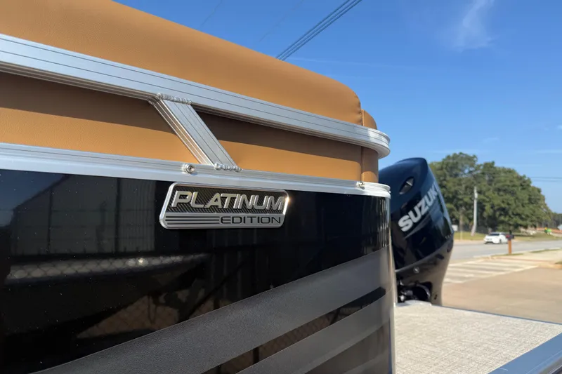 Slide: The Image of 2026 Avalon VENTURE QUAD LOUNGER Platinum Edition with Suzuki engine, outdoor setting. - 6