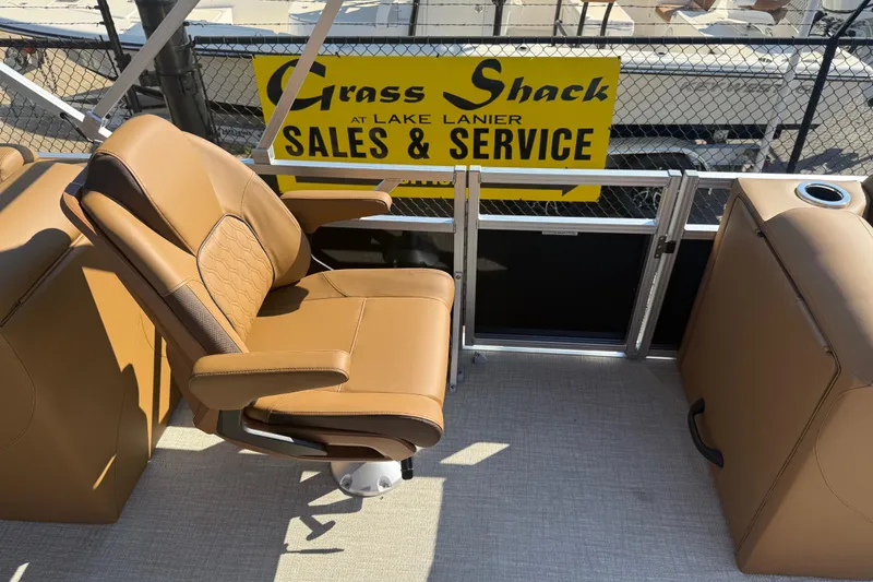 Slide: The Image of 2026 Avalon VENTURE QUAD LOUNGER with tan seating at Grass Shack, Lake Lanier. - 12