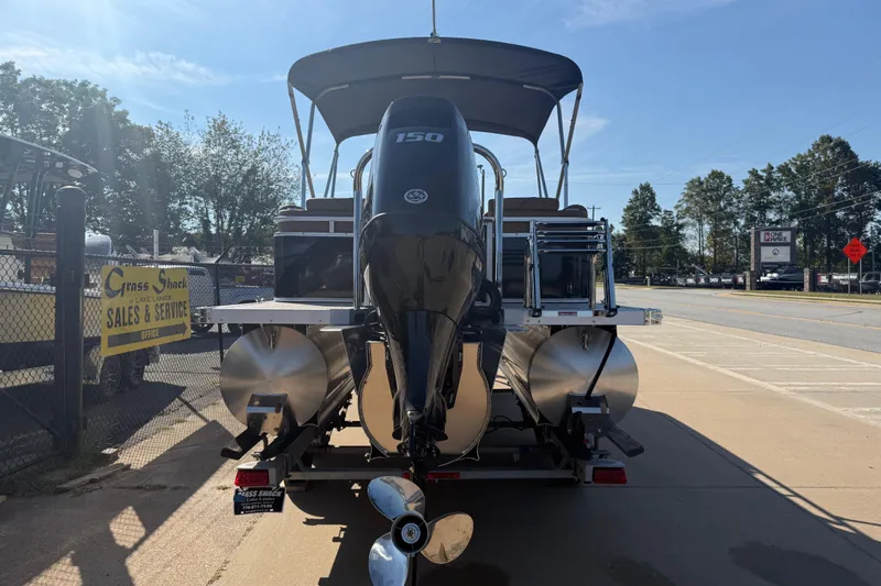 Slide: The Image of 2026 Avalon VENTURE QUAD LOUNGER boat with 150 HP engine at sales lot. - 8