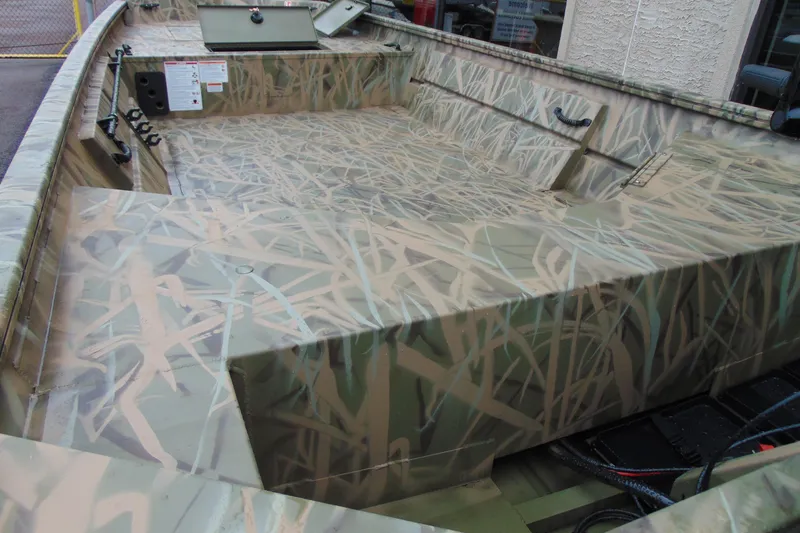 Slide: The Image of 2026 CRESTLINIER 1860 Retriever Deluxe Tiller boat with camouflage interior design. - 10