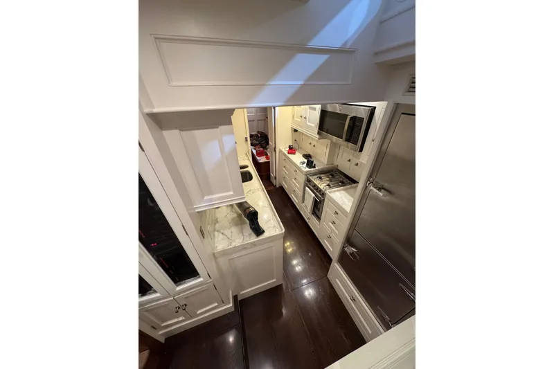 Slide: The Image of Compact shower with white tiles and turquoise accents, Brooklin Boat Yard 2009 model. - 25