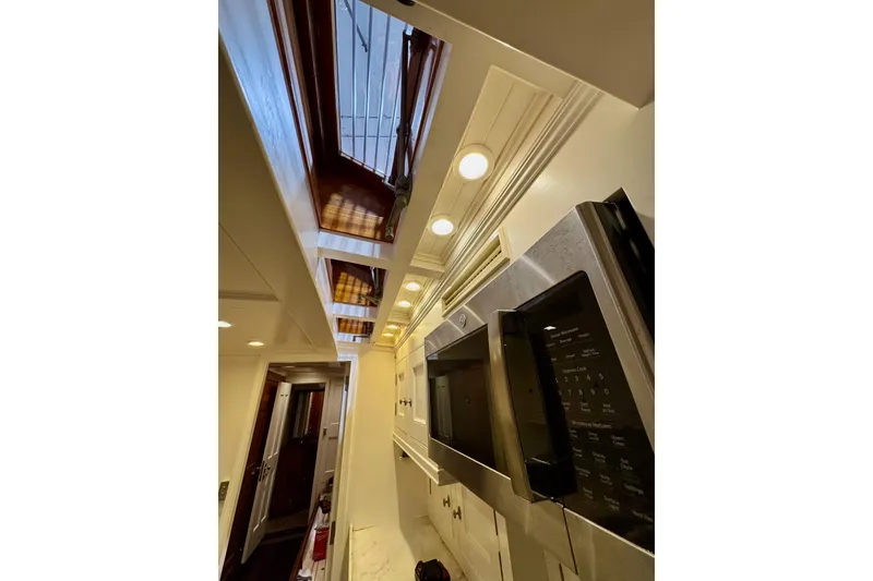 Slide: The Image of Luxurious 2009 Brooklin Boat Yard interior with elegant wood and frosted glass design. - 27