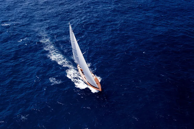 Slide: The Image of Aerial view of 2009 Brooklin Boat Yard sailboat navigating deep blue ocean waters. - 36