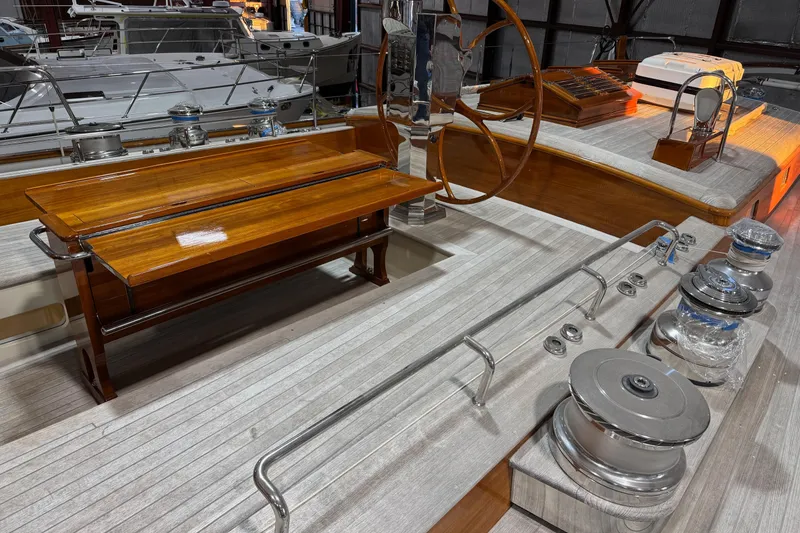Slide: The Image of Luxurious 2009 Brooklin Boat Yard deck with wooden seating and polished metal fittings. - 40