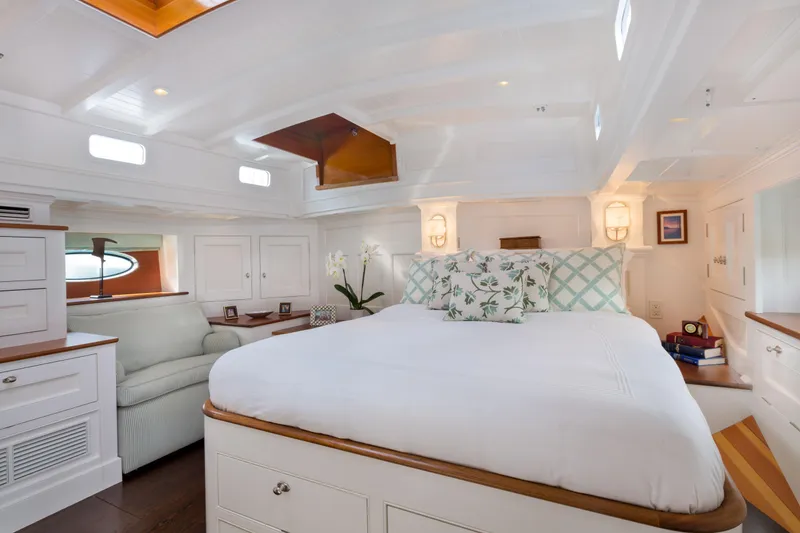 Slide: The Image of Elegant wooden staircase inside 2009 Brooklin Boat Yard model, featuring polished floors and cabinetry. - 8