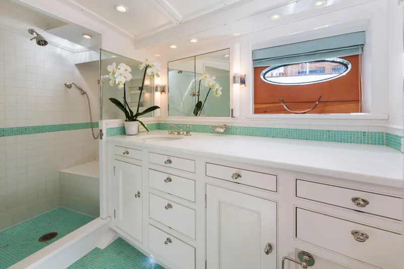 Slide: The Image of Luxurious 2009 Brooklin Boat Yard interior with cozy fireplace and elegant furnishings. - 9