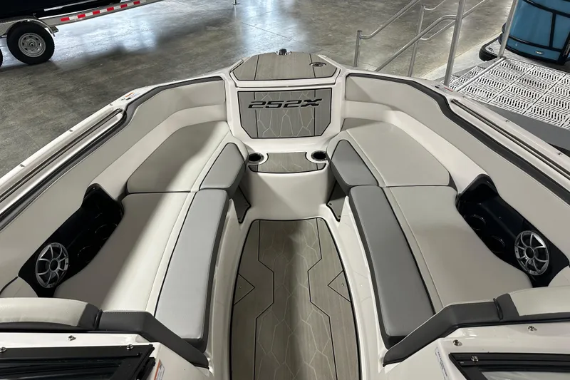 Slide: The Image of 2024 Yamaha Boats 252XE interior with spacious seating and modern design. - 14