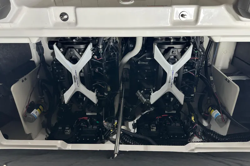 Slide: The Image of 2024 Yamaha Boats 252XE engine compartment showcasing dual engines and components. - 4