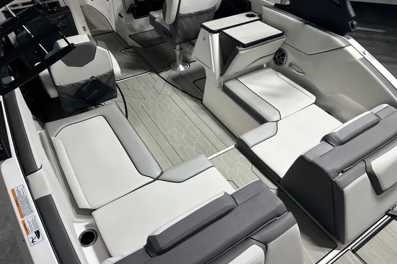 Slide: The Image of 2024 Yamaha Boats 252XE interior with sleek seating and modern design. - 8