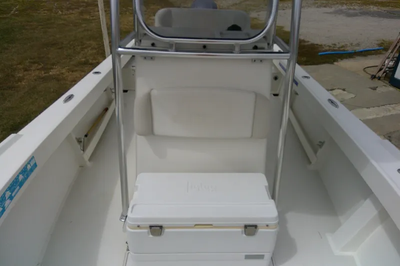 Slide: The Image of 2016 Parker 2100 Special Edition boat interior with seating and storage. - 15