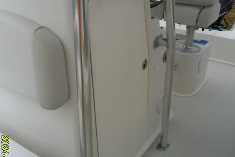 Slide: The Image of 2016 Parker 2100 Special Edition boat interior with seating and railing details. - 17