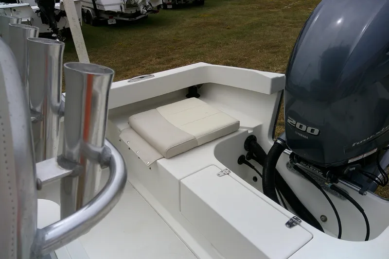 Slide: The Image of 2016 Parker 2100 Special Edition boat with Yamaha 200 engine, featuring rod holders. - 27