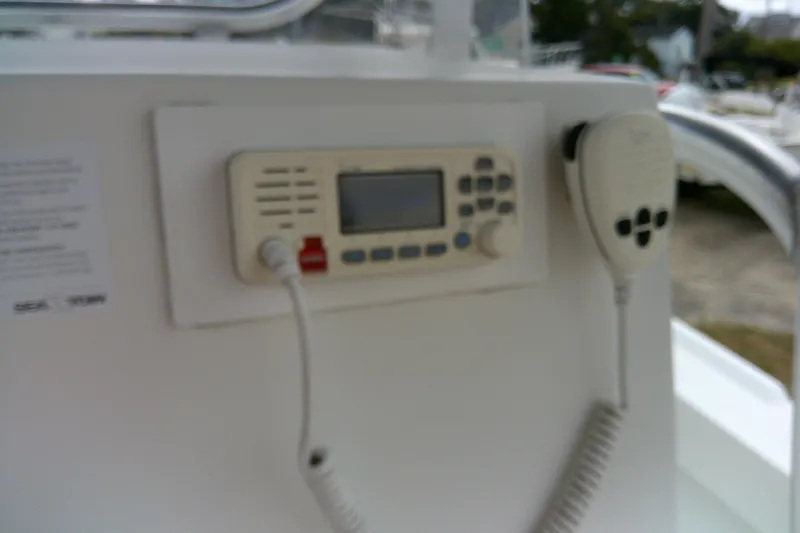 Slide: The Image of Control panel and microphone on 2016 Parker 2100 Special Edition boat. - 35