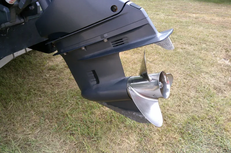 Slide: The Image of Close-up of a Parker 2100 Special Edition 2016 boat propeller on grass. - 9